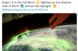 国际空间站宇航员拍到绝美极光照片：地球如穿上绿色纱衣